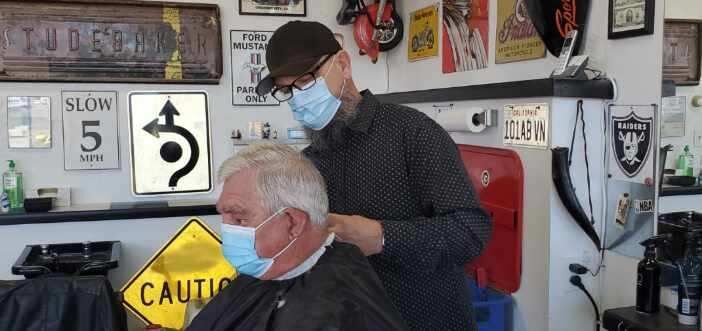 Barbershop, salon owners reopen with mixed emotions