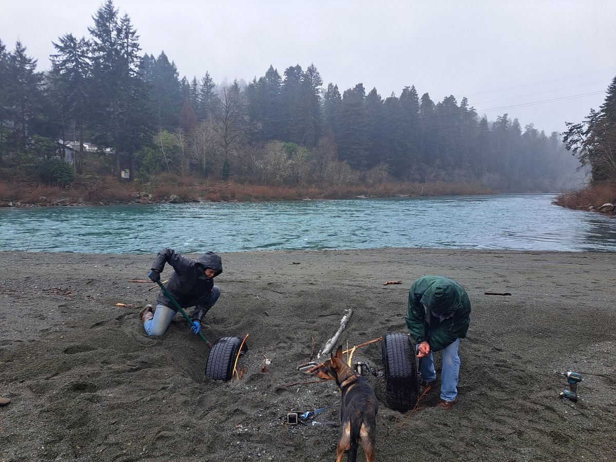 Volunteers begin to remove chassis