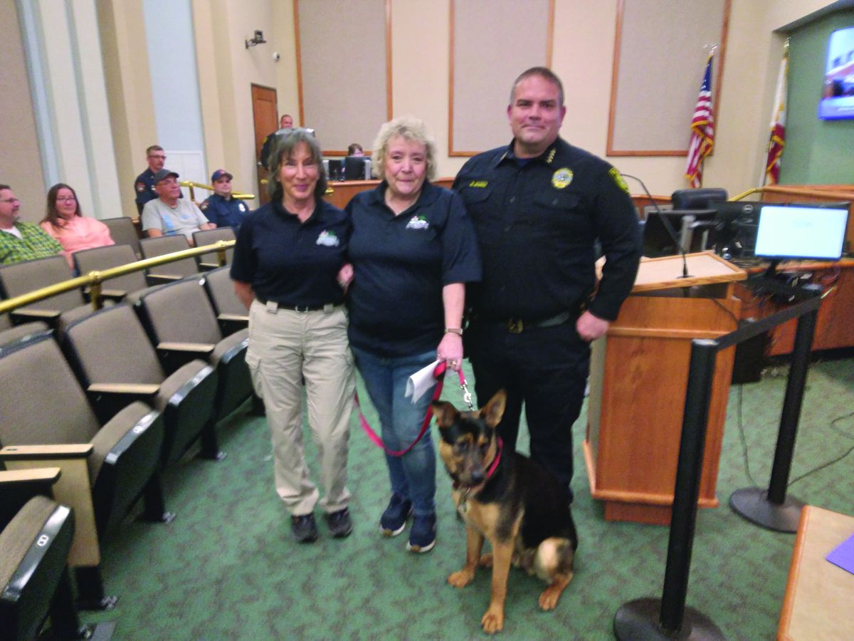 Volunteers honored for helping with canine program