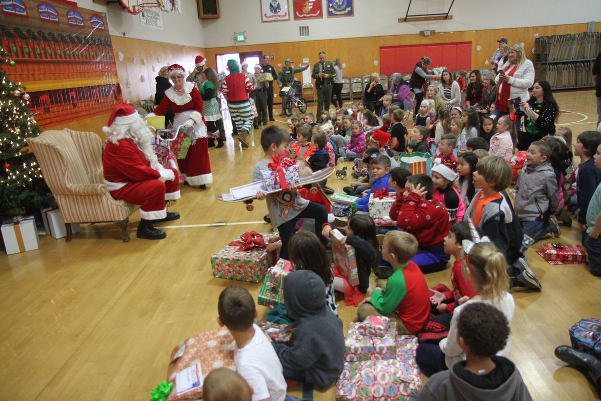 Operation Santa brings Christmas early to Redwood Elementary School