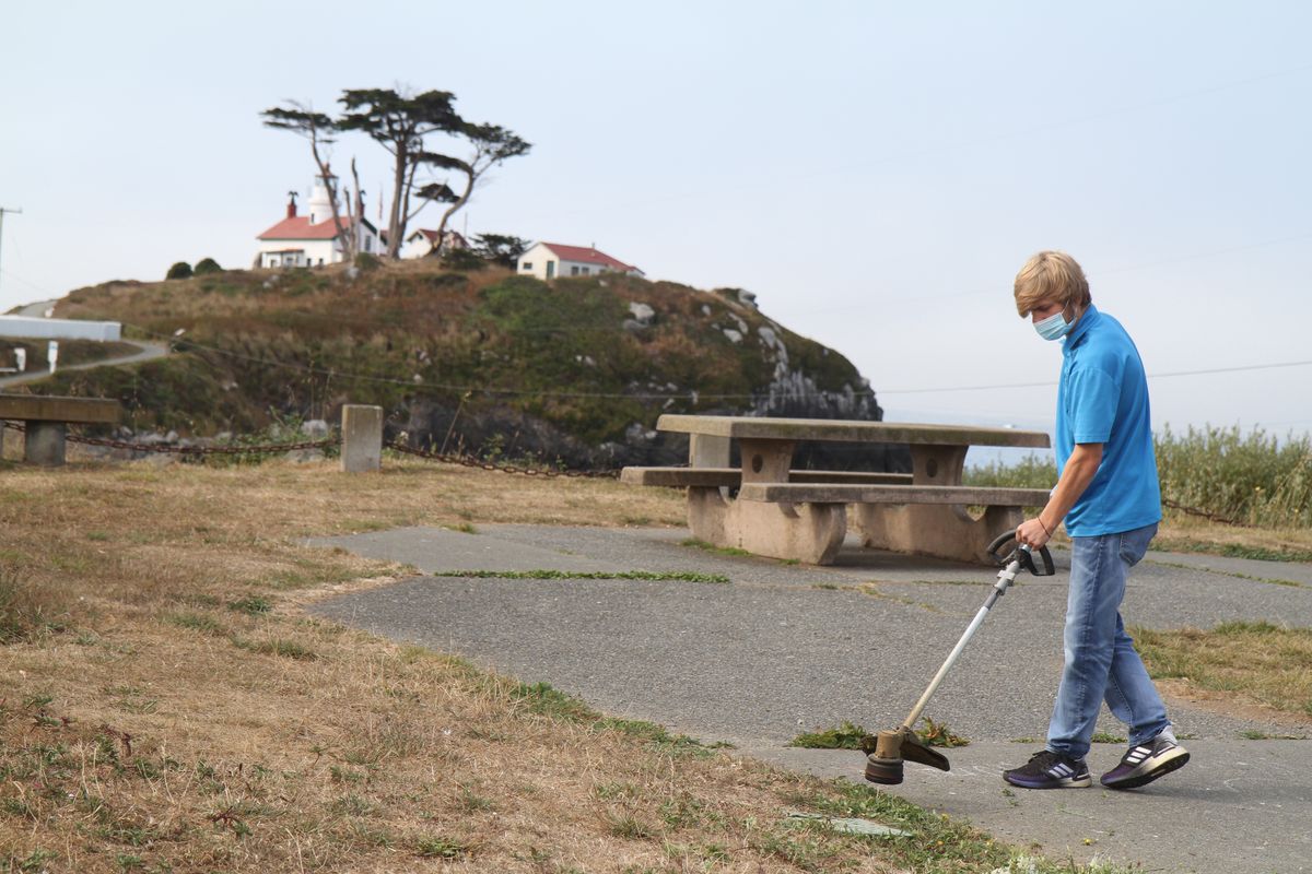 Volunteers take pride in battling overgrowth around town