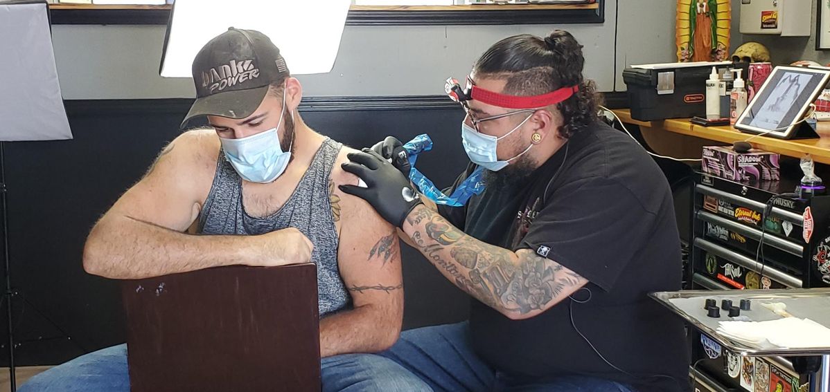 Tattoo artists happy to have clients back